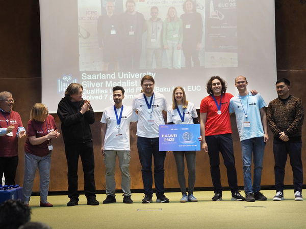 The winning team of Saarland University receiving their medals. Photo: MPI-INF